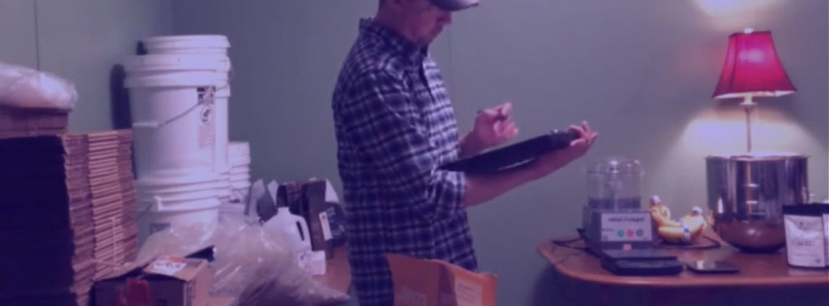 Founder counting GRITBAR inventory while discussing responsibility behind real momentum
